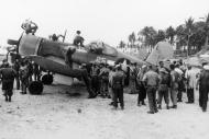 Asisbiz Vought F4U 1A Corsair VMF 216 W25 17736 with wounded Robert Marshall Torokina Bougainville 19th Dec 1943 01