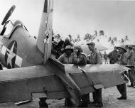 Asisbiz Vought F4U 1A Corsair VMF 216 W25 17736 with wounded Robert Marshall Torokina Bougainville 19th Dec 1943 04