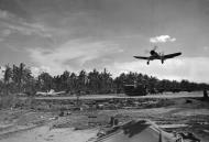 Asisbiz Vought F4U 1A Corsairs VMF 216 White 54 taking off at Cape Torokina Bougainville Dec 1943 01