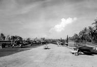 Asisbiz Vought F4U Corsairs from VMF 216 and Hellcats from VF 33 aircraft prepare for a raid on Rabaul Bougainville 17th Dec 1943 02