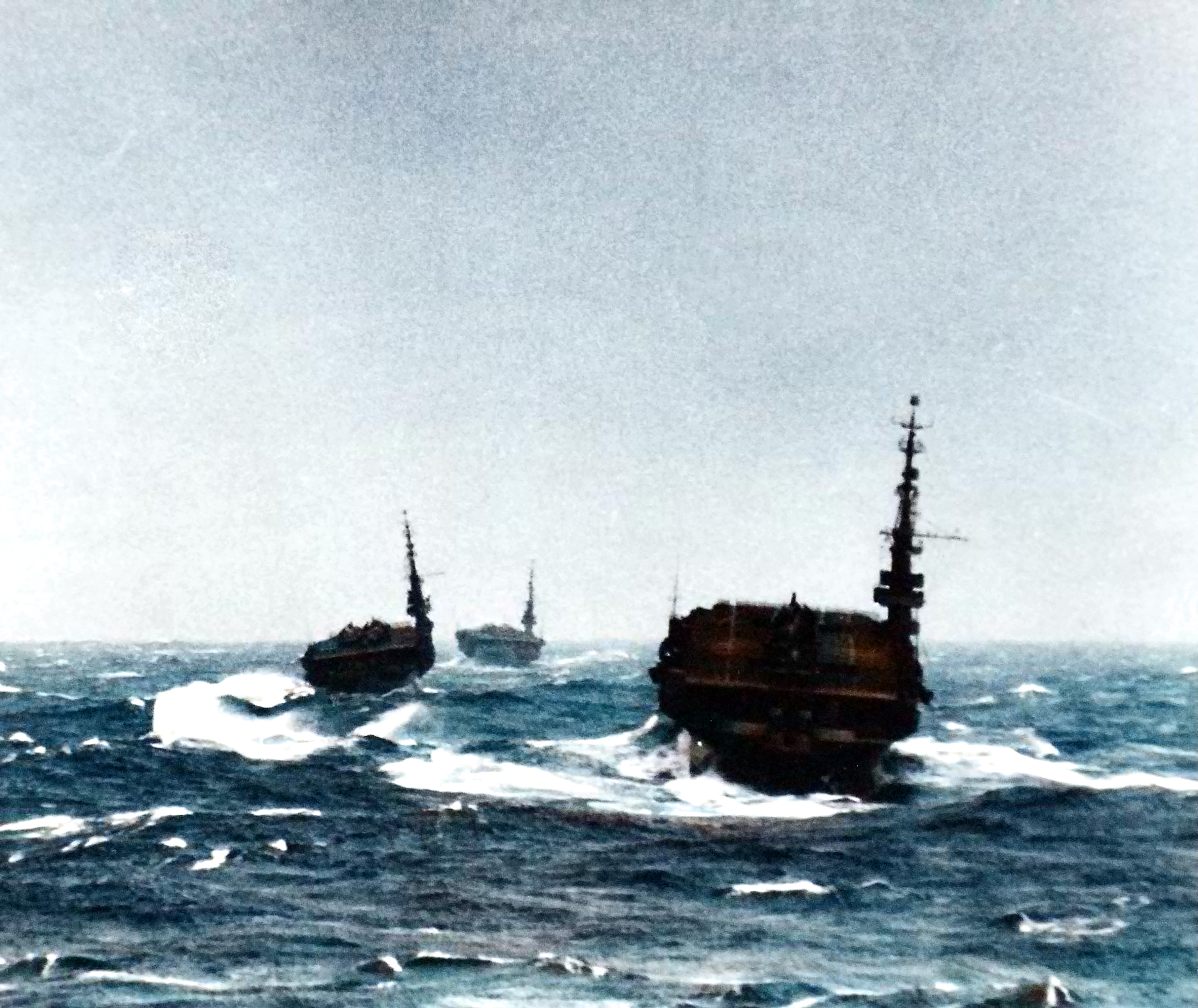 Carrier Division 27 during a China Sea Typhoon with USS Block Island (CVE 106) USS Siboney (CVE 112) and USS Gilbert Island (CVE 107)