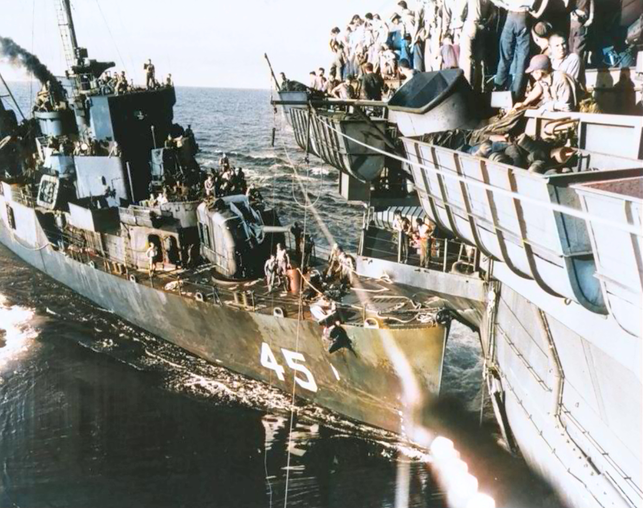 USS Lee Fox (APD-45) after colliding with USS Gilbert Islands (CVE-107) in 1945