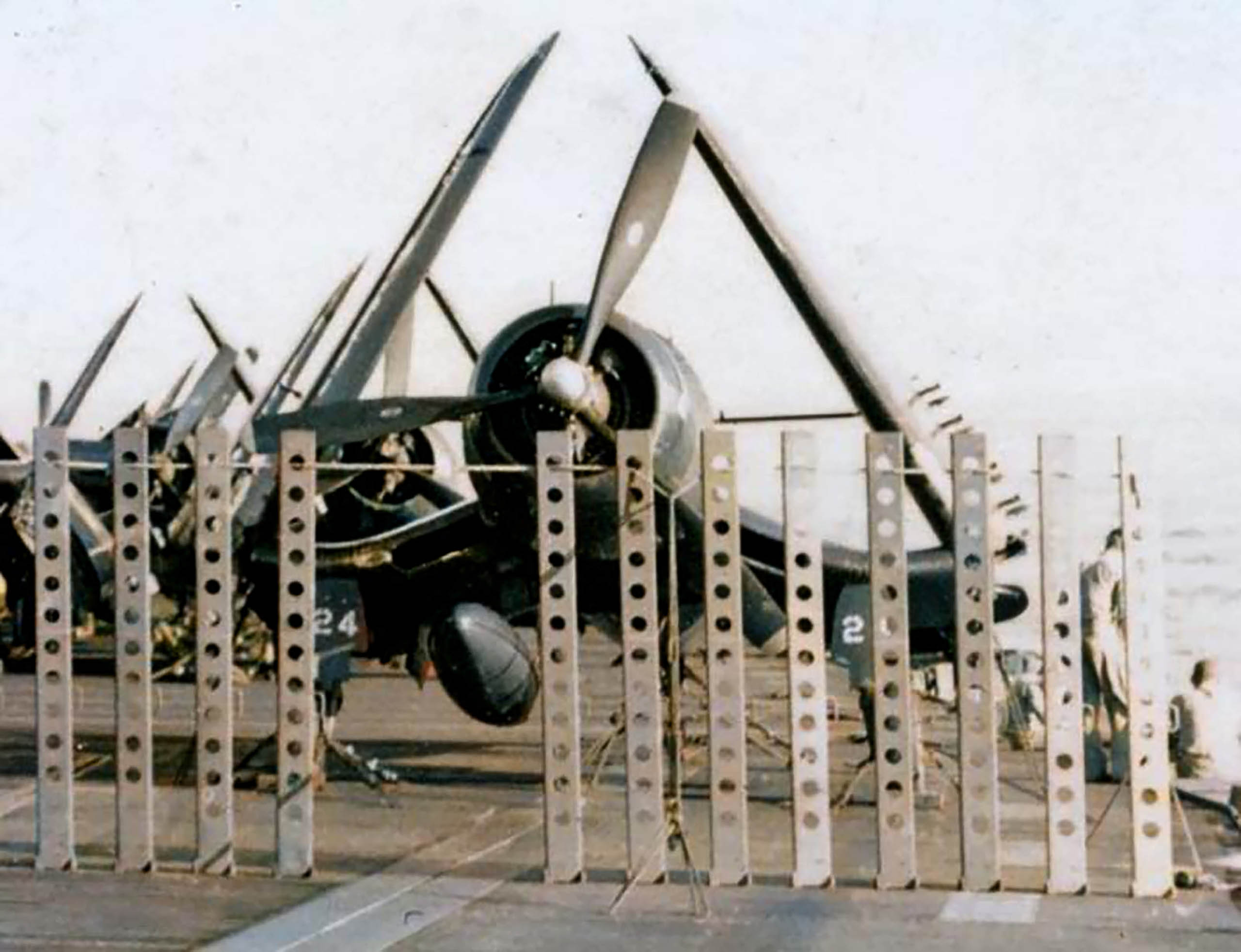 Vought F4U-1D Corsair VMF-512 White 24 typhoon barrier aboard USS Gilbert Islands (CVE 107) in 1945
