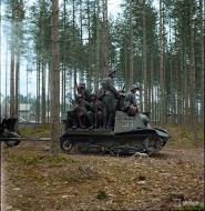 Asisbiz Finnish captured Soviet Komsomolets T20 tank tractor moving to the front line at Lauritsala 21st Aug 1941 color 01