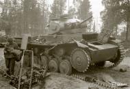 Asisbiz German Panzer II tank knocked out at Kokkosalmen Sohjana road 2nd Aug 1941 33301