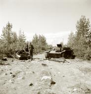 Asisbiz German Panzer II tanks hit a mine at Vasonvaara Vuokkiniemi 1st Jul 1941 23030