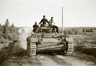 Asisbiz German Panzer III tanks moving to the front lines Vasonvaara 1st Jul 1941 22891