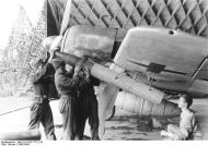 Asisbiz Focke Wulf Fw 190A8 Stab II.JG26 being loaded with 21cm mortar France 1943 01