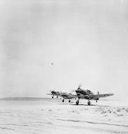 Asisbiz Curtiss Tomahawks RAF taking off North Africa IWM JAR611