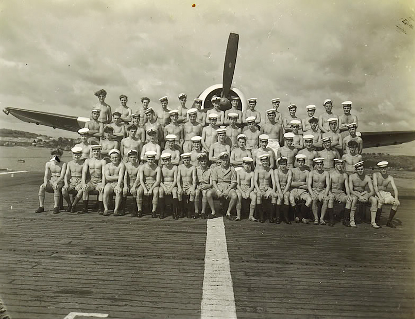 Asisbiz Aircrew Fleet Air Arm Personnel Pose Infront Of A Hellcat