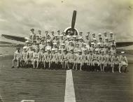 Asisbiz Aircrew Fleet Air Arm personnel pose infront of a Hellcat 01