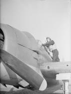 Asisbiz Fleet Air Arm Grumman Hellcat FN327 cockpit at RAF Wittering 27th Oct 1943 IWM A20022