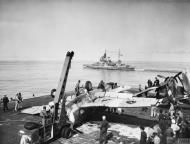 Asisbiz Fleet Air Arm Hellcat crash aboard HMS Khedive with HMS Queen Elizabeth off Miyako Island 4th May 1945 IWM A28933