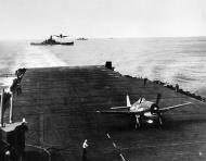 Asisbiz Grumman F6F 3 Hellcats from VF 16 landing CV 16 USS Lexington with BB 57 USS South Dakota 1944 01