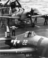 Asisbiz Grumman F6F 5 Hellcat VF 22 White 22 and 41 preparing for luanch USS Hornet 1945 01