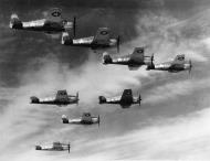 Asisbiz Grumman F6F 3 Hellcat VF 3 Whie E1 flying in formation near San Diego CA 1943 01