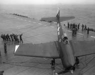 Asisbiz Grumman F6F 5 Hellcat VF 3 White 2 Henry M Rowland lands a battle damaged ac without a tail hook 02