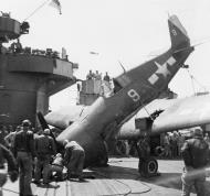 Asisbiz Grumman F6F 5 Hellcat VF 3 White 9 landing mishap CV 10 USS Yorktown 1945 01