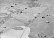 Asisbiz Hurricane IIc Trop RAF 166 Wing in flight from Chittagong in India May 1943 IWM CI190