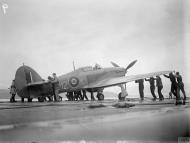 Asisbiz Fleet Air Arm 801NAS Sea Hurricane M2K aboard HMS Argus being pushed back prior to launch IWM A18868