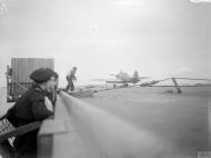 Asisbiz Fleet Air Arm 801NAS Sea Hurricane M2K aboard HMS Argus being pushed back prior to launch IWM A18877