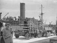 Asisbiz Merchant ship Troilus freight being emptied in Grand Harbour Malta 16th Jun 1942 IWM A10409