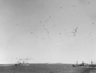 Asisbiz Sky is filled with anti aircraft shells as the convoy steams on to Malta Operation Pedestal Aug 1942 IWM A11178