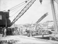 Asisbiz Unloading timber from lighters in the dockyard Grand Harbour Malta 19 24 Aug 1942 IWM A11494
