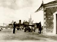 Asisbiz Reinforcing Crete scene on the quayside on the arrival of some of the British troops IWM E1175