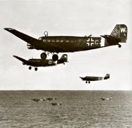 Asisbiz MTO Junkers Ju 52 1.KGrzbV Wittstock 7V+CJ rud W1L with 7V+CM n 7V+CH over the Mediterranean 1943 Transporter P68