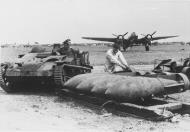 Asisbiz MTO Junkers Ju 88A being rearmed in Sicily 5th Apr 1941 NIOD