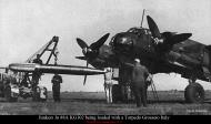 Asisbiz Junkers Ju 88A KG102 being loaded with a Torpedo Grosseto Italy 01