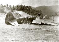 Asisbiz 41 38499 Bell P 39D Airacobra destroyed on the ground by Japanese air raid based in New Guinea 01