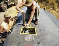Asisbiz WWII USAAF color photo closeup of Bell P 39 Airacobra wing armament 01