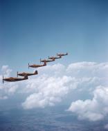 Asisbiz WWII USAAF color photo of Bell P 63 Kingcobras during formation training June 1945