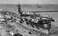 Asisbiz Curtiss P 40F Warhawks being loaded aboard CVE 28 USS Chenango 02