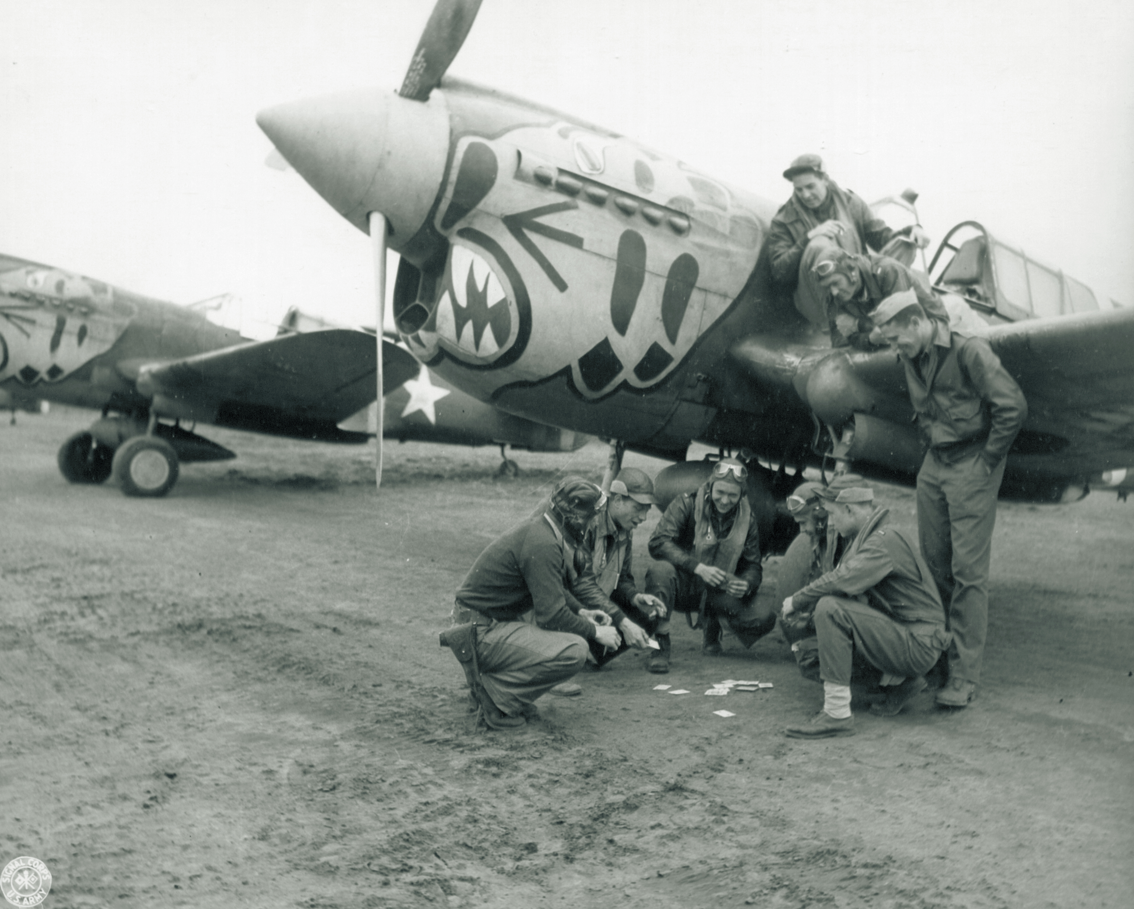 Asisbiz Curtiss P-40E Warhawk 343FG11FS Aleutian Tigers pilots play ...