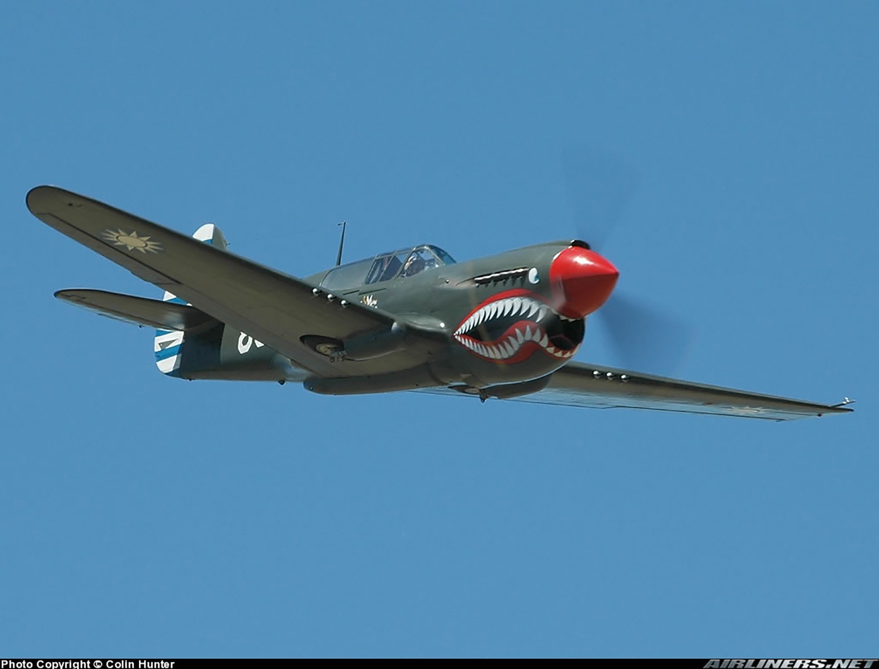 Asisbiz Airworthy warbird Curtiss P-40N Warhawk NZ3009 Flying Tigers 88 11