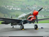 Asisbiz Airworthy warbird Curtiss P 40N Warhawk NZ3009 Flying Tigers 88 07