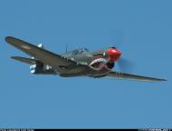 Asisbiz Airworthy warbird Curtiss P 40N Warhawk NZ3009 Flying Tigers 88 11