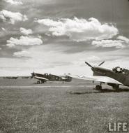 Asisbiz Curtiss P 40 Warhawk 57FG65FS White 35 taking off Hun Hunter III flown by Gil Wymond 01