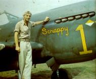 Asisbiz Curtiss P 40E Warhawk 57FG Charles Jaslow with Scrappy 1 Bradley Field Connecticut USA 1942 01