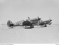 Asisbiz Curtiss P 40E Kittyhawk RAAF 450Sqn OKH and OKR Egypt Aug 1942 AWM 024694