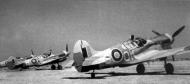 Asisbiz Curtiss P 40K Kittyhawk RAAF 450Sqn OKO and OKM going throught pre flight checks Libya 1943 01
