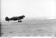 Asisbiz Curtiss P 40K Kittyhawk RAAF 450Sqn OKR landing Kairouan Tunisia 18th Apr 1943 AWM MEC0453