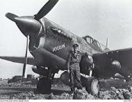 Asisbiz Curtiss P 40N Kittyhawk RAAF 450Sqn OKx PO Garry Blumer with Jocelyn fully ladened Italy 1945 AWM UK2706