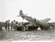 Asisbiz USAAF 44 7845 P 40N Kittyhawk RAAF 75sqn GAE A29 1019 landing mishap Tarakan Borneo 28th Jun 1945 AWM 110298
