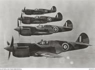 Asisbiz Curtiss P 40E Kittyhawk RAAF 2OTU Echelon right formation based at Mildura Victoria 16th Jun 1942 AWM AC0073
