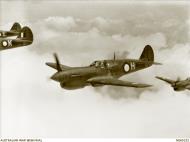Asisbiz Curtiss P 40N Kittyhawk RAAF 84Sqn LBH A29 503 with LBK A29 518 over Torres Strait 23rd Dec 1943 AWM NEA0252