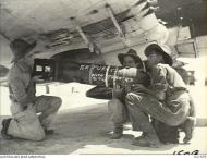 Asisbiz RAAF loading captured Japanese bombs Returned with thanks to Tojo Noemfoor 28th Aug 1944 AWM OG1579